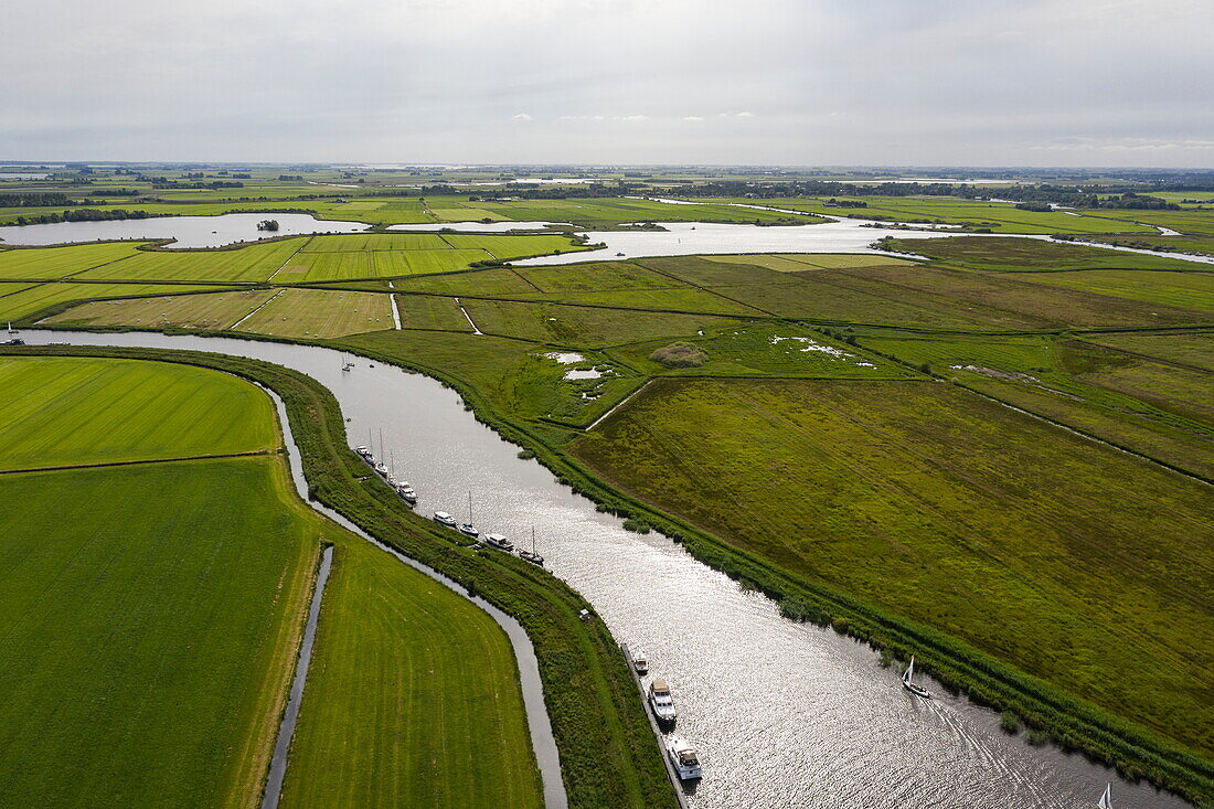 Aerial view of boats on river Noarder Alde Wei, Broek, Friesland, Netherlands, Europe