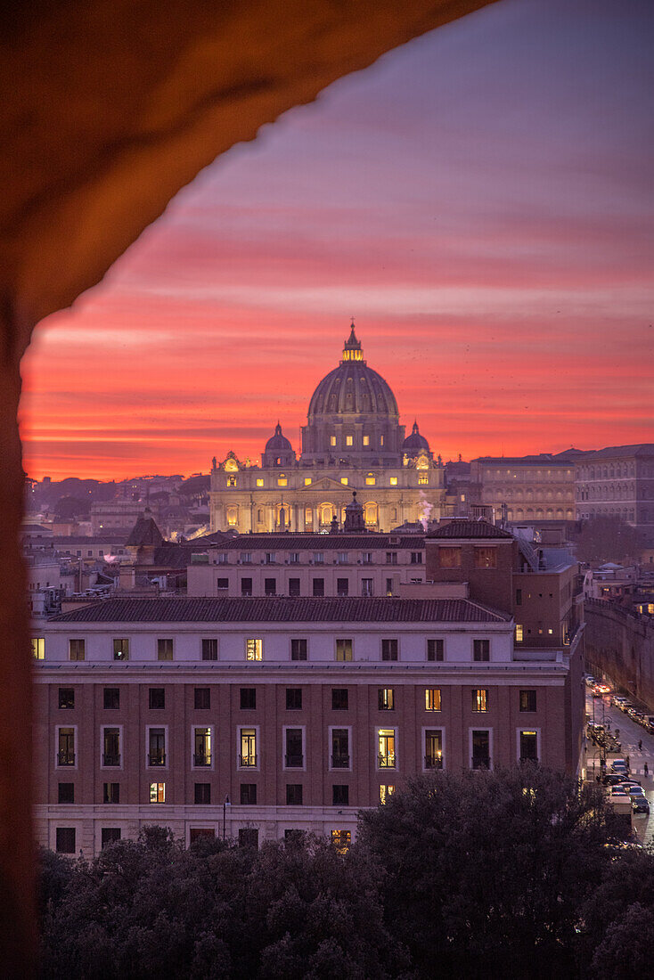 View of the Vatican in fading daylight from the castle windows of Castel Sant'Angelo in Rome, Italy