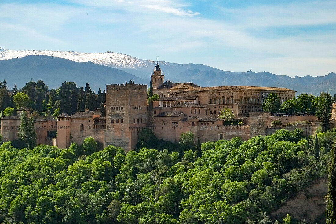 Spain, Granada, Royal Alhambra Palace with mountain landscape