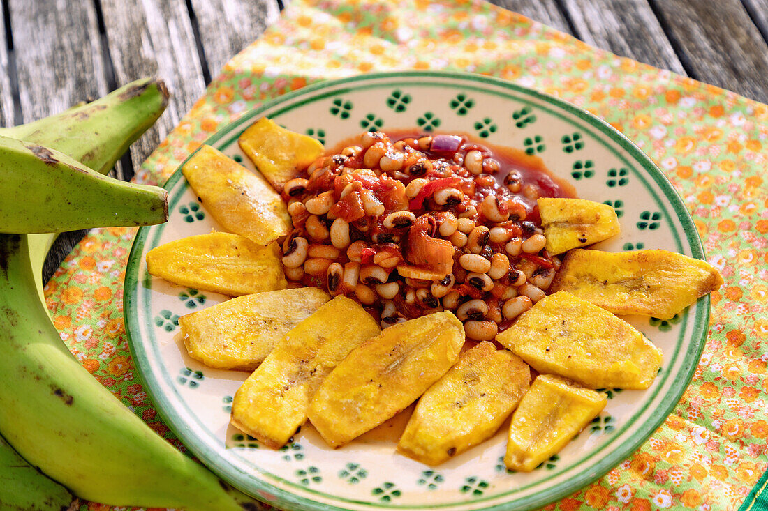 Red Red West African dish of fried plantains and black-eyed peas in tomato sauce served in Ghana West Africa