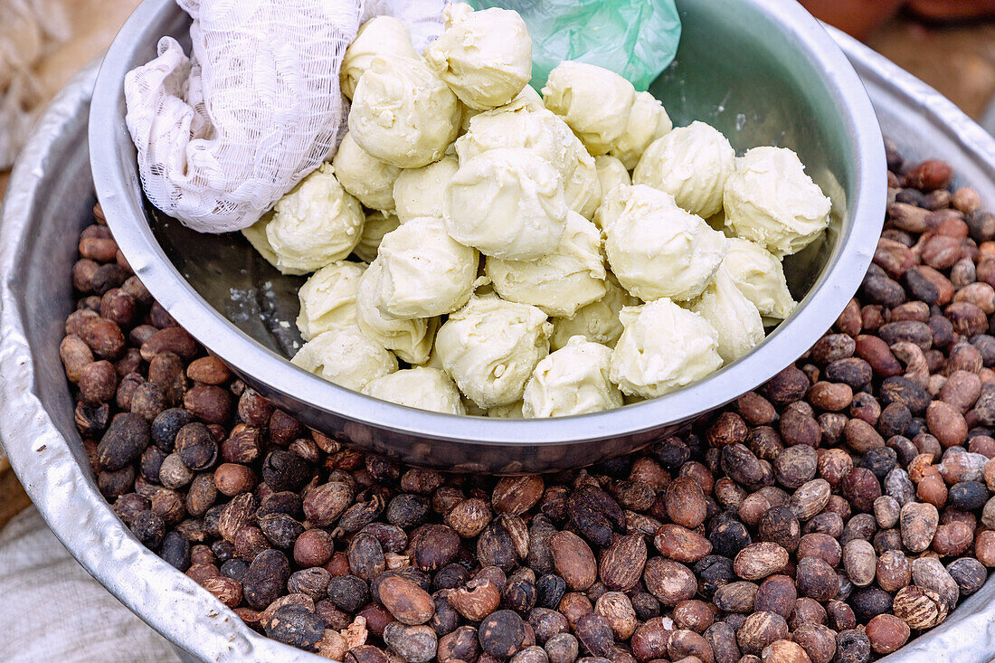 Corn dumplings and cocoa beans at the market in Sawla in the Savannah region of central Ghana in West Africa