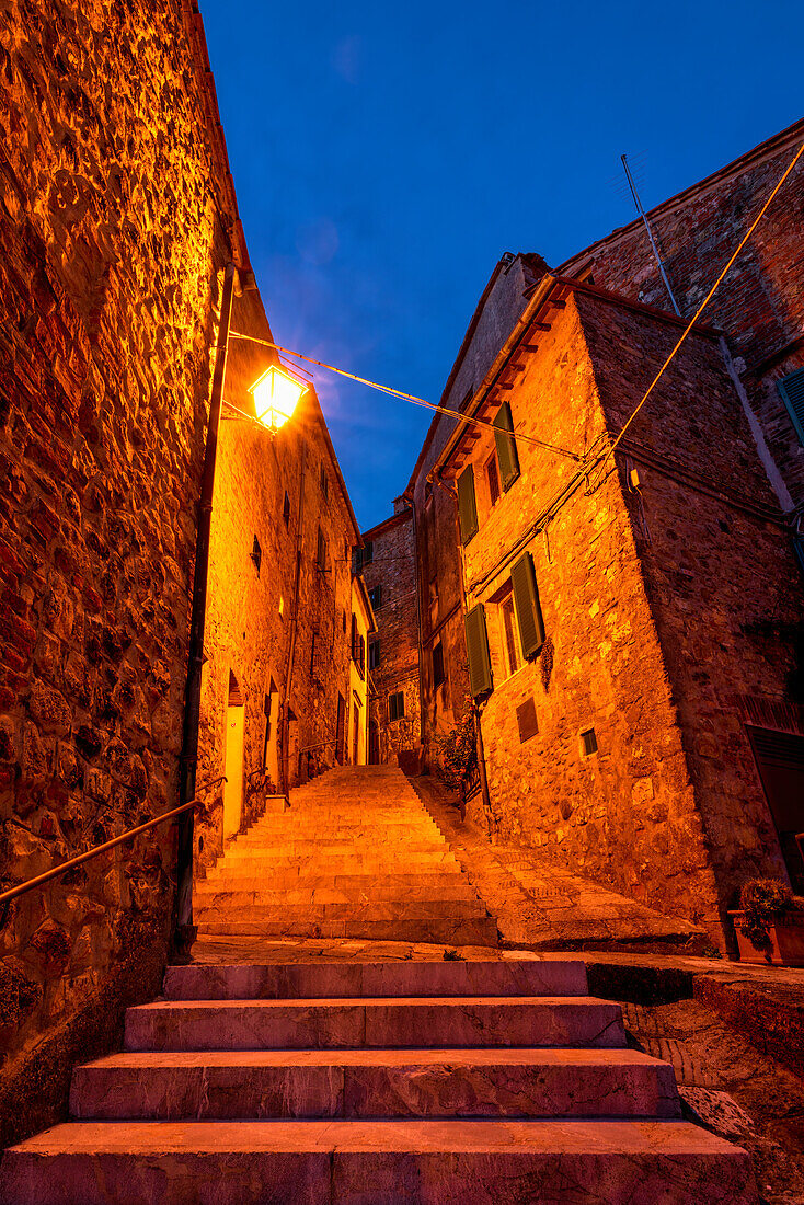 At night in the streets of Chiusdino, Province of Siena, Tuscany, Italy