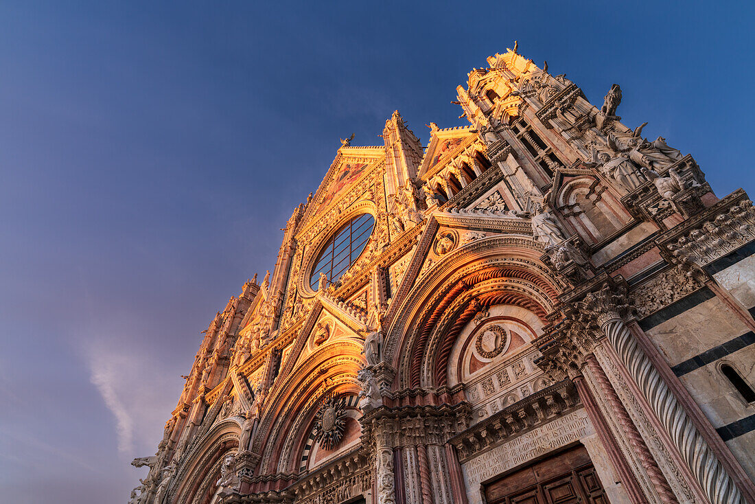 Evening in front of Siena Cathedral, Tuscany, Italy
