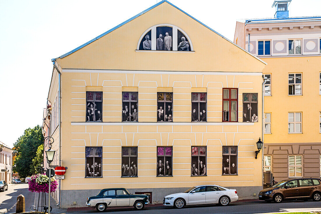 University building with photos of professors, Tartu, Estonia