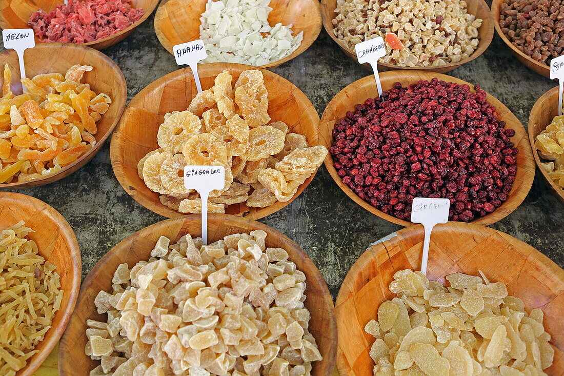 Dried fruits at the market on Rue des Halles, Carpentras, Vaucluse, Provence-Alpes-Côte d'Azur, France