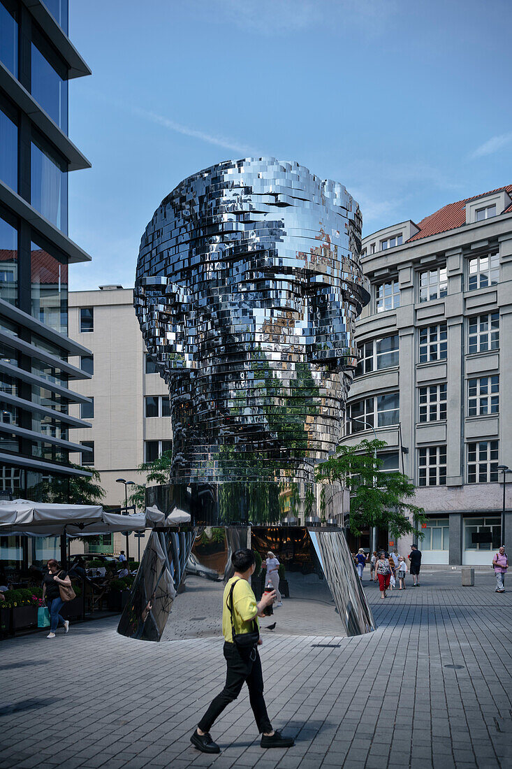 mirrored and rotating Franz Kafka statue, Prague, Bohemia, Czech Republic, Europe, UNESCO World Heritage Site