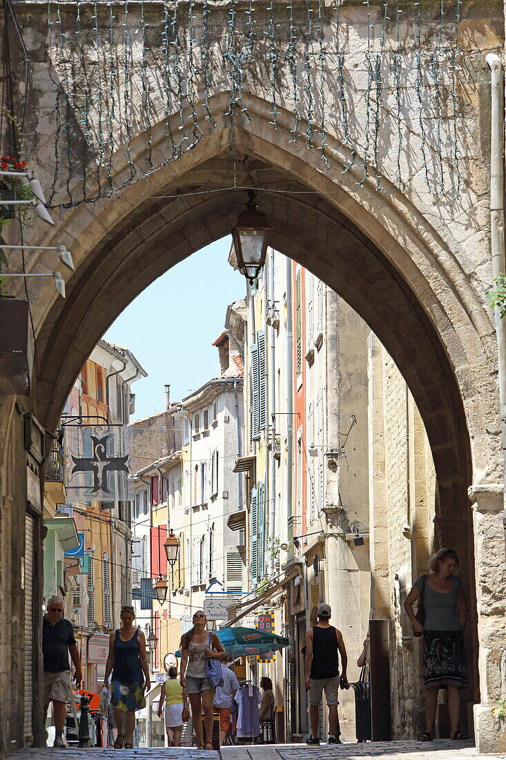 View through Porte de Saignon onto Rue Saaint-Pierre, Apt, Vaucluse, Provence-Alpes-Côte d'Azur, France