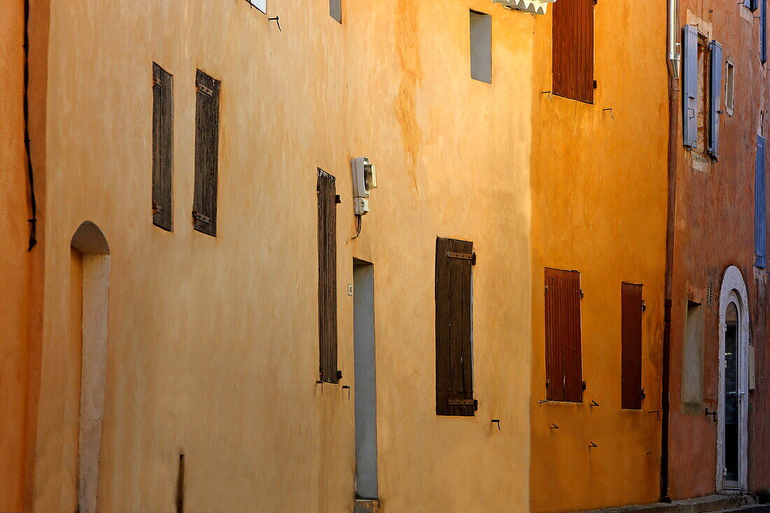 Facades painted with ocher in Flassan, Vaucluse, Provence-Alpes-Côte d'Azur, France