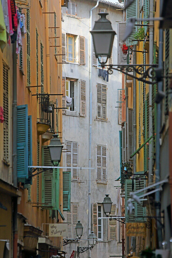 Narrow street in the old town of Nice, Alpes-Maritimes, Provence-Alpes-Côte d'Azur, France