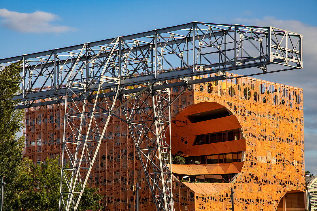 The Orange Cube by architects Jakob MacFarlane next to the Saône River in the Confluence District, Lyon, Lyon, Rhône, France, Europe