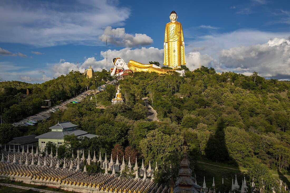 Reclining Buddha and Laykyun Sekkya Standing Buddha Statue at Maha Bodhi Tahtaung Monastery, Monywa Township, Sagaing Region, Myanmar, Asia