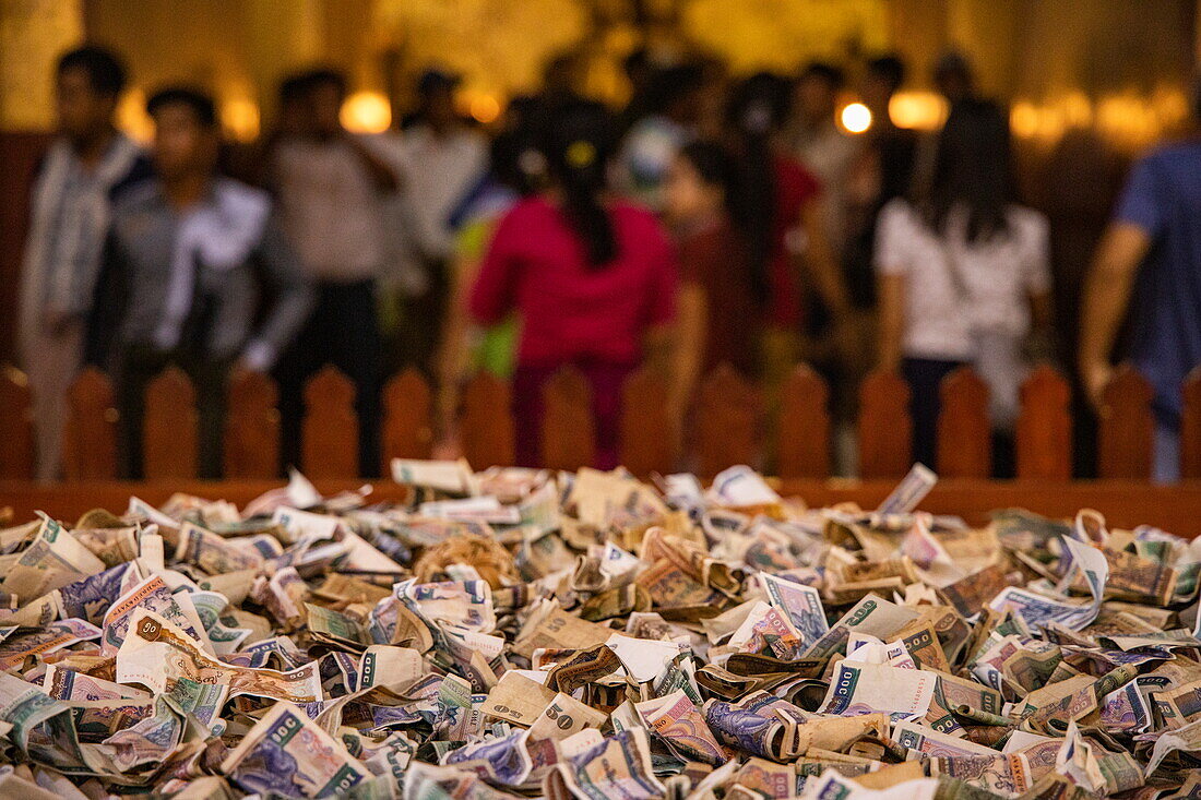 Detail of monetary offerings made by worshipers at Ananda Temple, Old Bagan, Nyaung-U, Mandalay Region, Myanmar, Asia