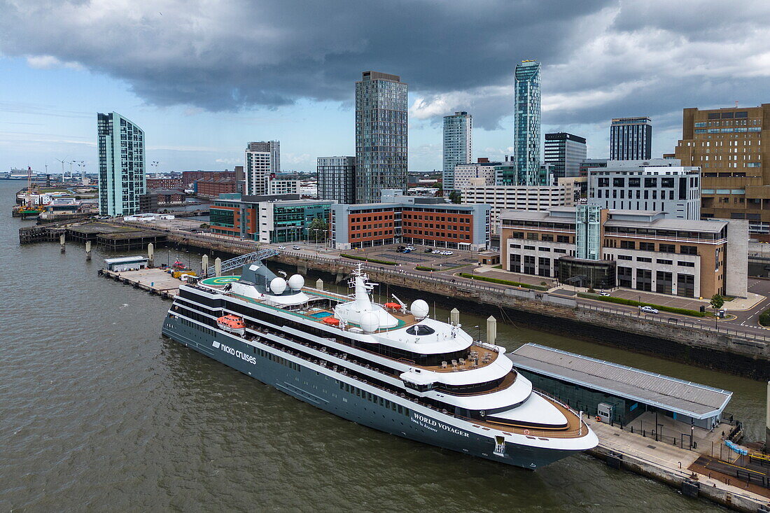 Aerial view of expedition cruise ship World Voyager (nicko cruises) at Liverpool Cruise Terminal with city beyond, Liverpool, England, United Kingdom, Europe
