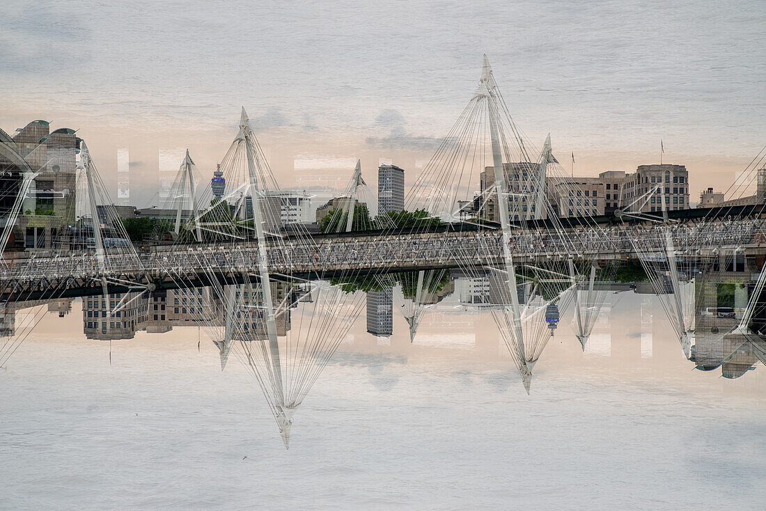 Double exposure of the Golden Jubilee Bridge crossing the river Thames in London, UK.