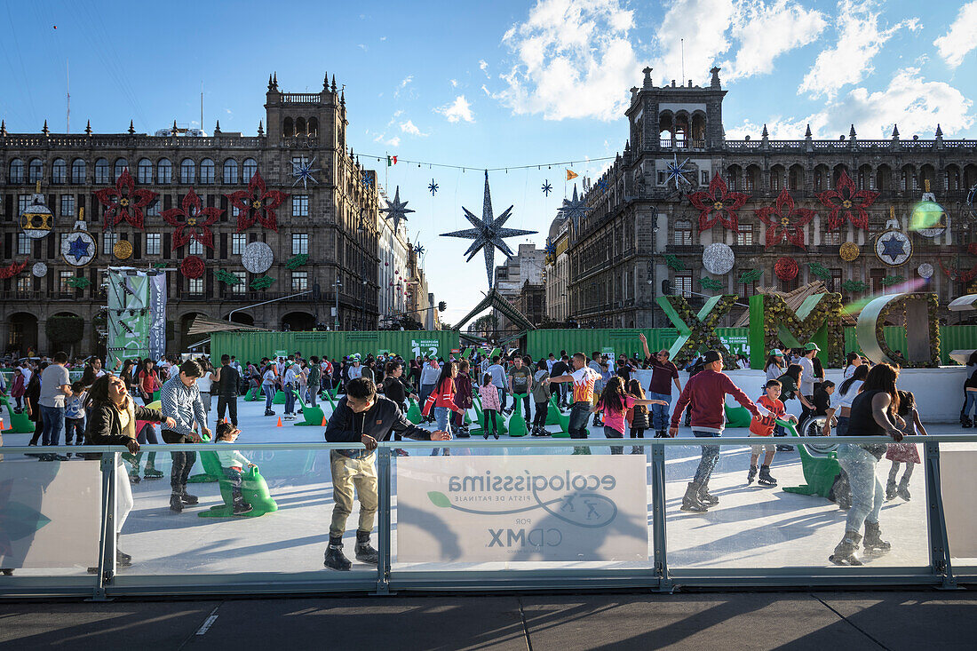 Ice skating at the Zocalo (Plaza de la Constitucion), Mexico City, Mexico, North America, Latin America, UNESCO World Heritage