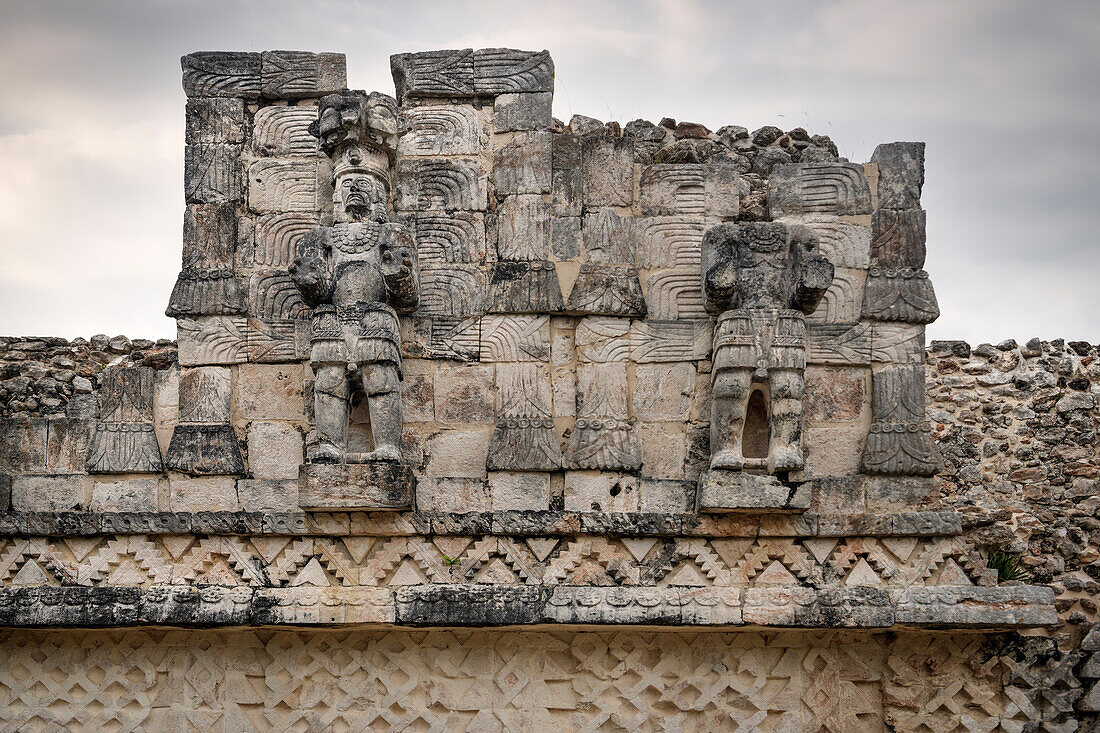 Royal figures at the Palace of the Masks (Codz Poop), Kabah, Mayan ruined city on the Ruta Puuc, Mexico, North America, Latin America