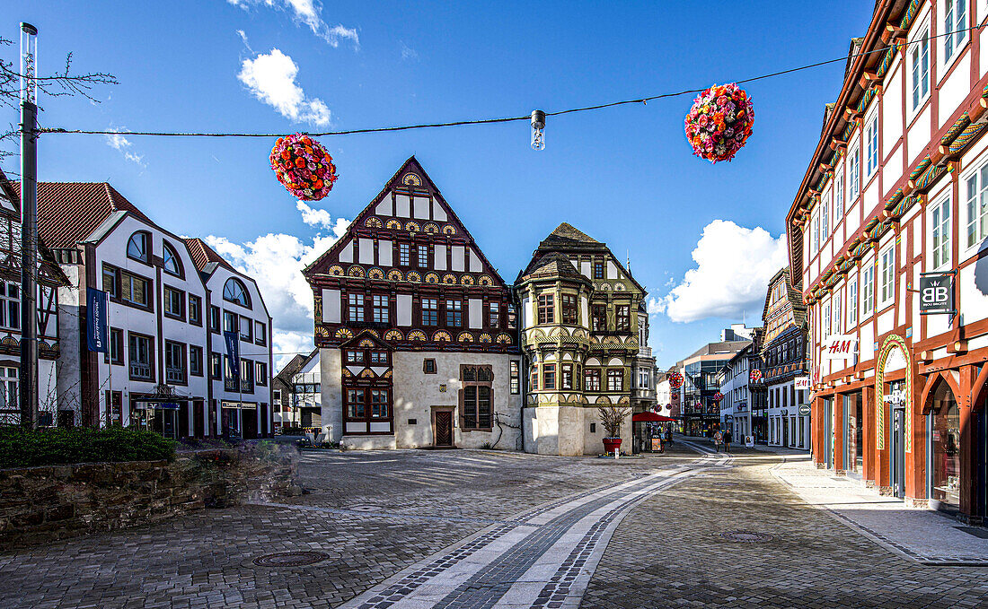 Flower arrangements for the State Garden Show, half-timbered houses in Marktstrasse, Höxter, Weser Uplands, North Rhine-Westphalia, Germany