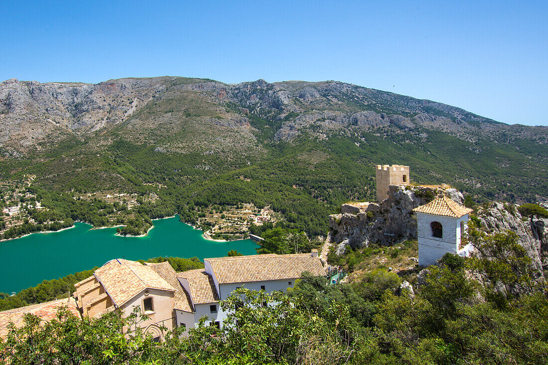 Guadalest mountain fortress in the Serella mountains of the Costa Blanca, with a reservoir, much visited, Spain