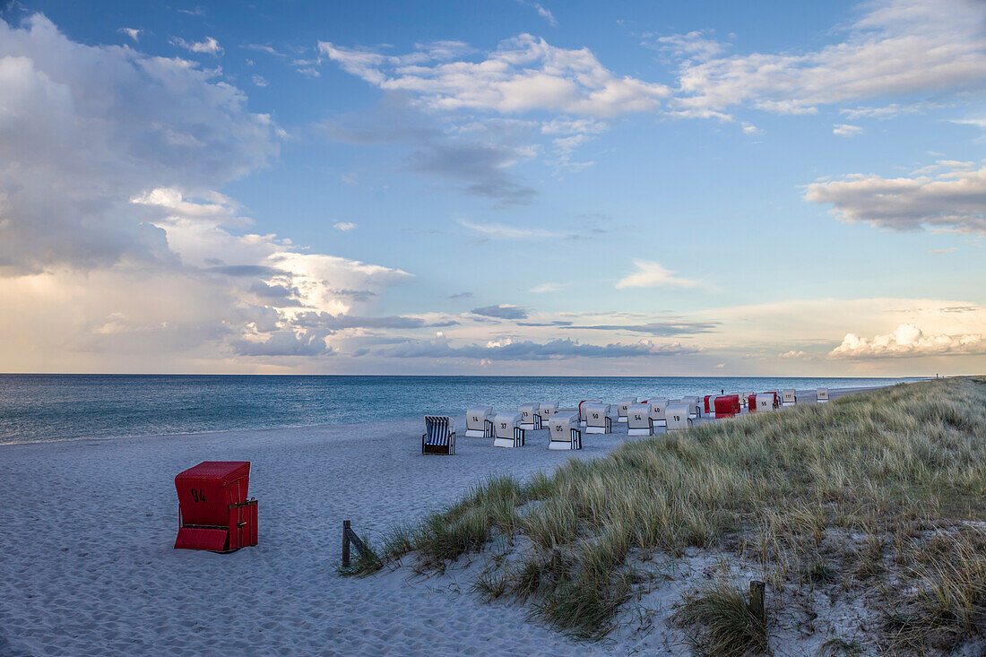 Beach chairs with storm clouds in Prerow, Mecklenburg-West Pomerania, Northern Germany, Germany