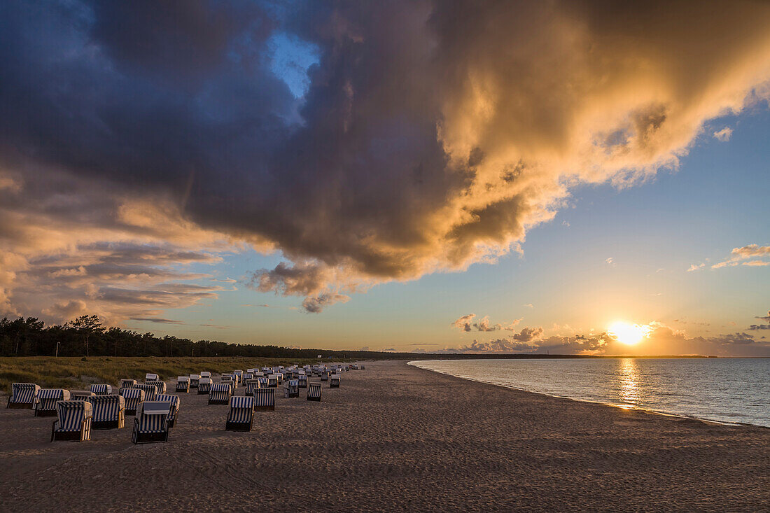 Beach chairs with sunset in Prerow, Mecklenburg-West Pomerania, North Germany, Germany