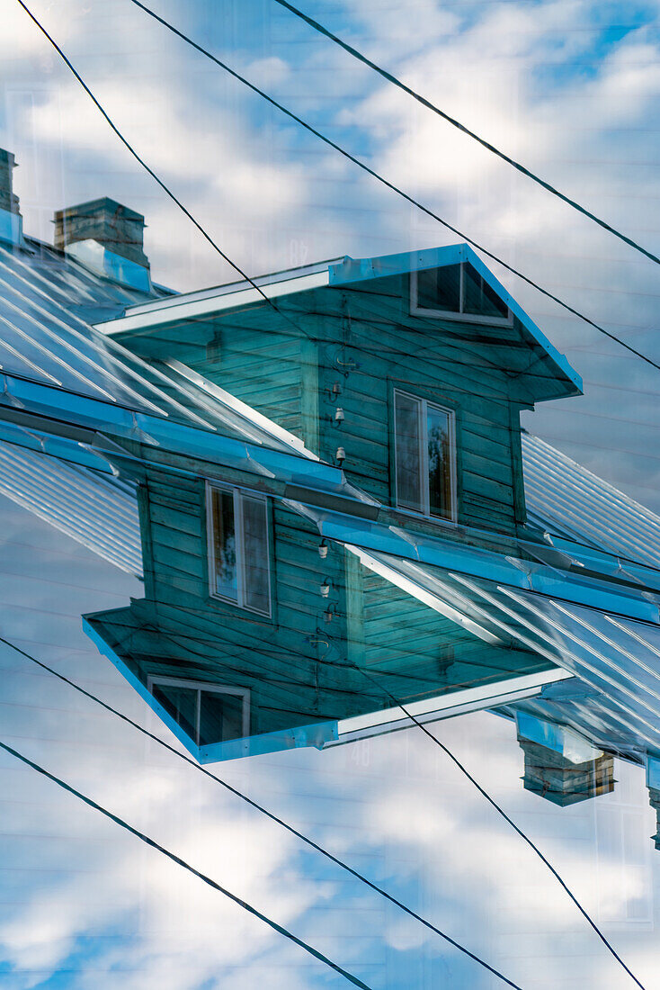 Colorful double exposure of wooden clad houses in Tartu, Estonia.