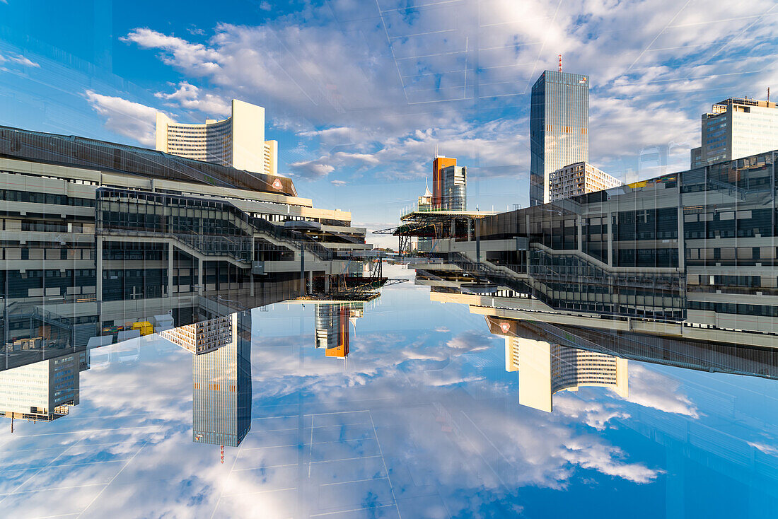 Double exposure of a modern housing complex on the left bank of the river Donau in Viennna, Austria, as seen from the Leonard Bernstein Street.