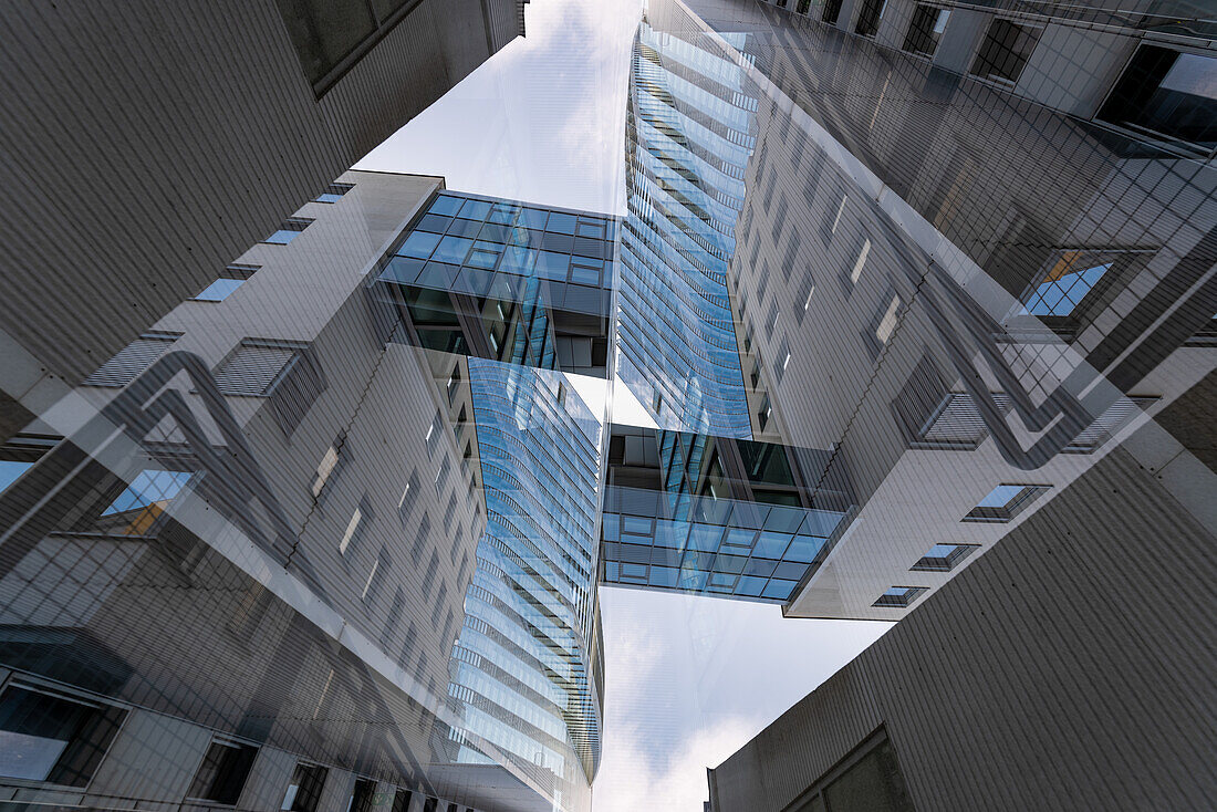 Double exposure of a modern building in Vienna, Austria, as seen from the Lilienbrunngasse.