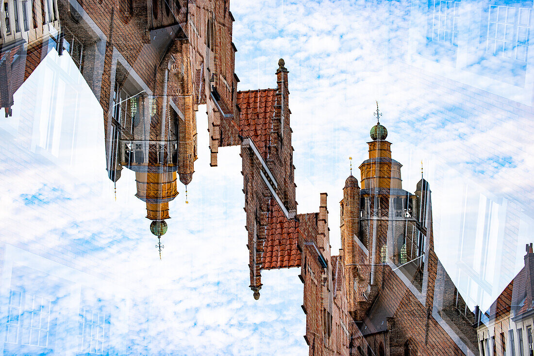 Double exposure of a stepped gable house and the Jerusalem church in Bruges, Belgium.