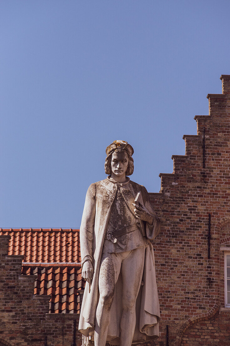 Statue, mittelalterlicher Kaufmann aus Brügge, Belgien.