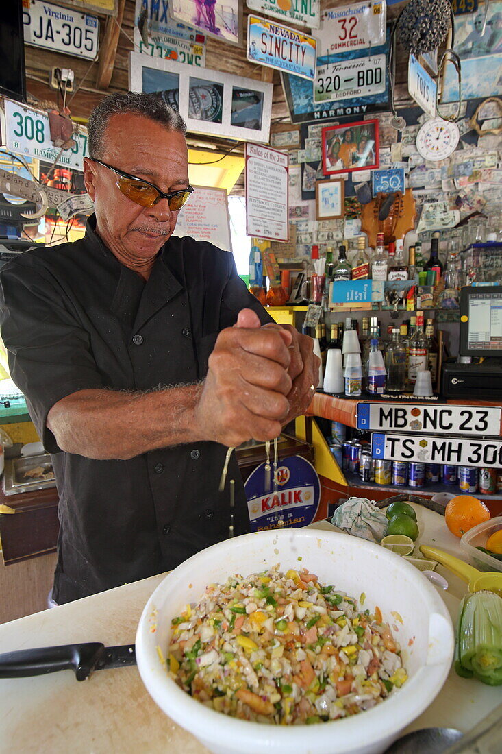 Preparing a Conch Salad at Max Conch Bar, Deadman's Cay Settlement, Long Island, The Bahamas