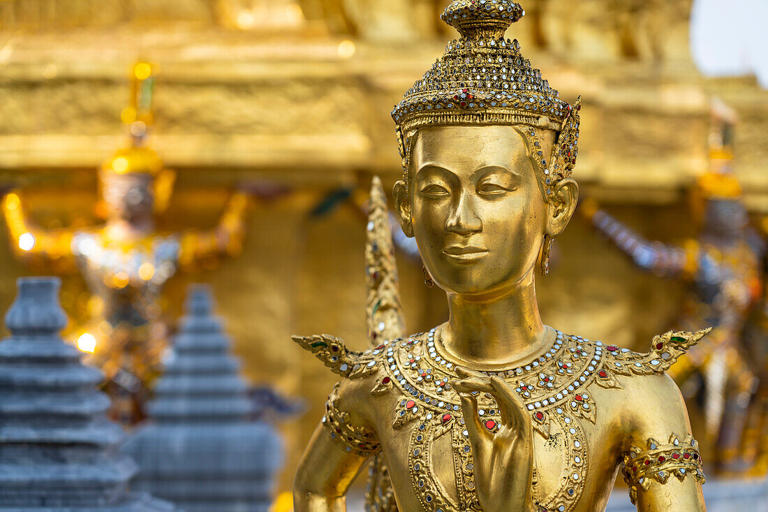 Gilded statue of a mythological creature at Wat Phra Kaeo, the King's Buddhist temple, Grand Palace Bangkok, Thailand, Asia