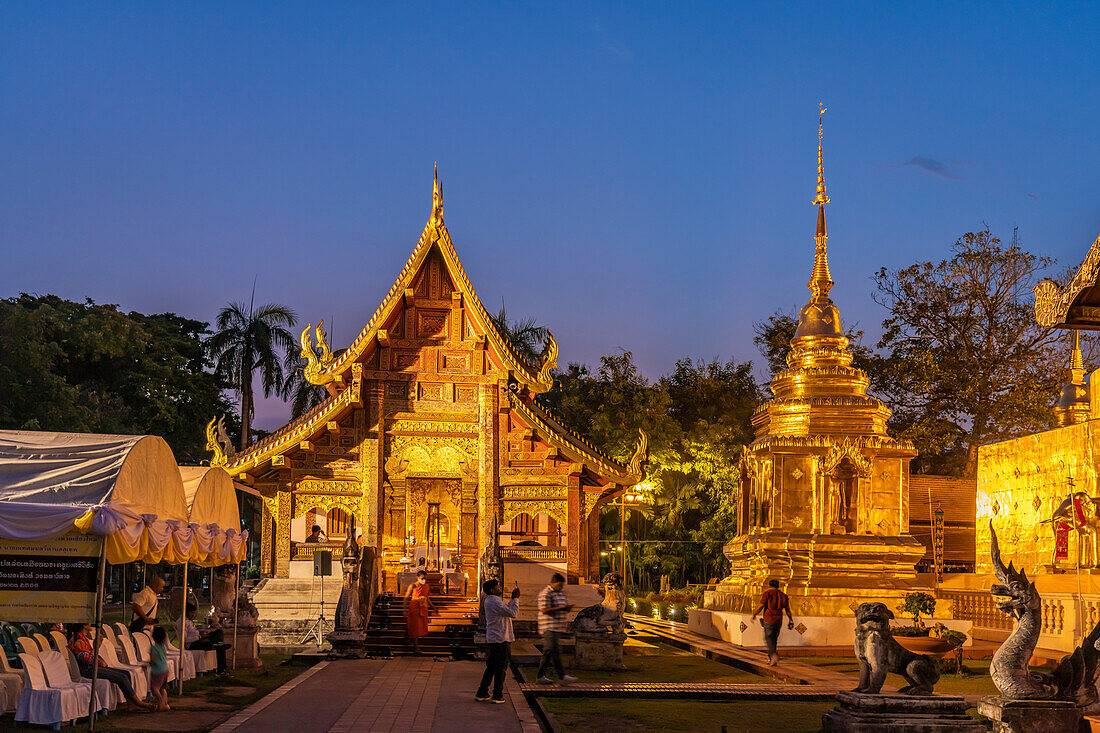 The Buddhist temple complex of Wat Phra Singh at dusk, Chiang Mai, Thailand, Asia