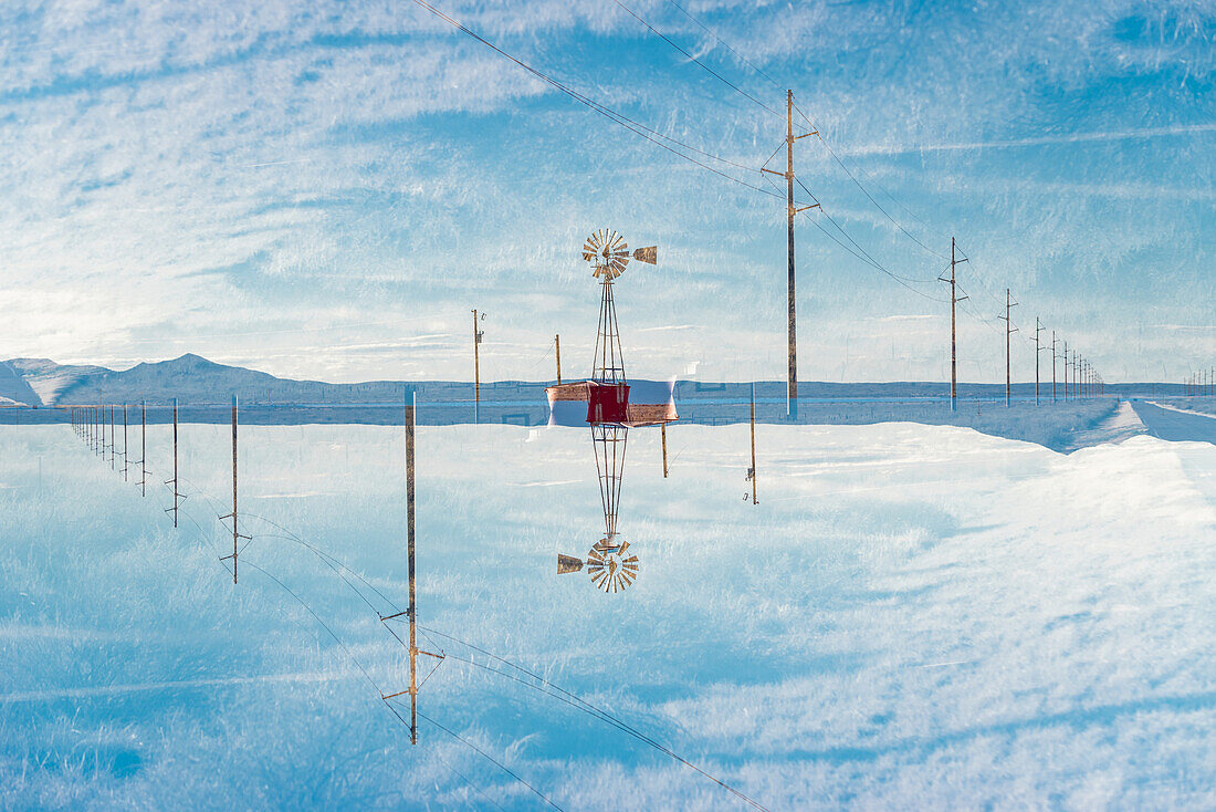 Double exposure of a windmill in the New Mexico desert.