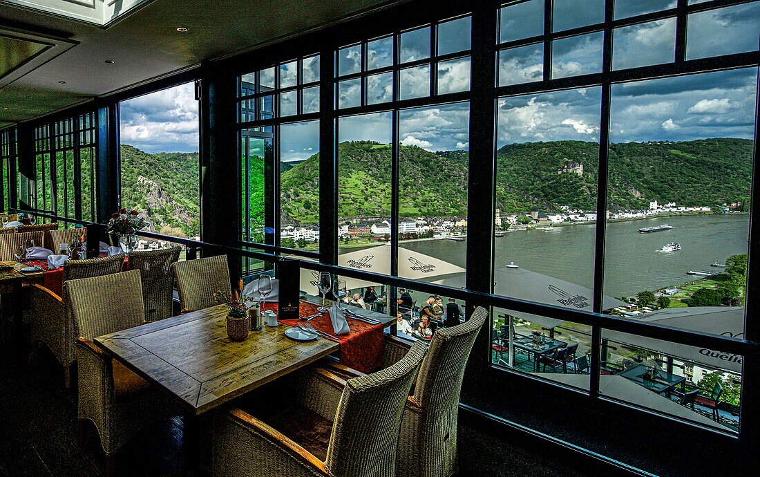 View from the restaurant of Hotel Schloss Rheinfels to the Rhine and St. Goarshausen; St. Goar, Upper Middle Rhine Valley, Rhineland-Palatinate, Germany