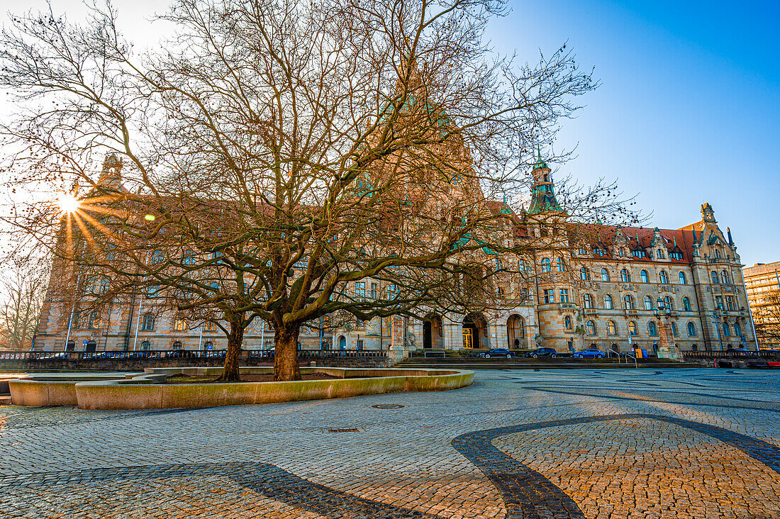 The &quot;New Town Hall&quot; at Tramplatz with sun star, Hanover, Lower Saxony, Germany