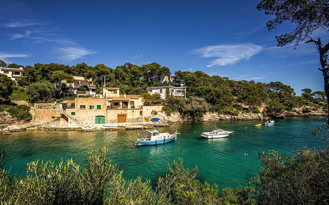 Boats, fisherman's houses with boat garages and villas, Cala Figuera, Santanyí municipality, Mallorca, Spain