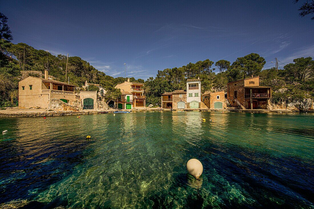 Fishermen's houses in a quiet bay, Cala Figuera, Santanyí, Mallorca, Spain