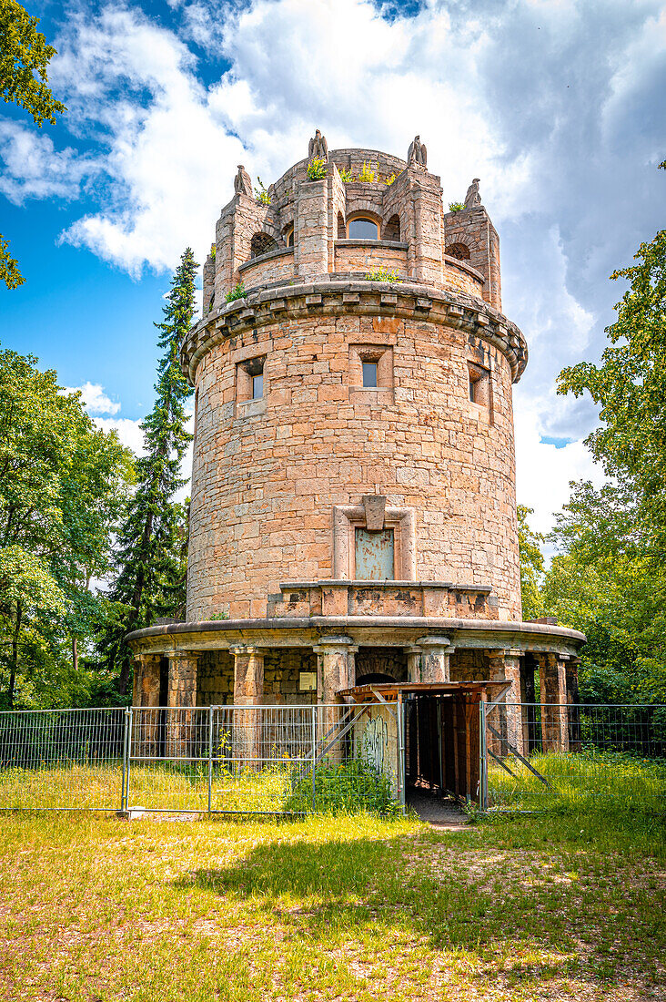 The Bismark Tower in Jena am Forst in the forest with a blue sky and veil clouds, Jena Thuringia, Germany