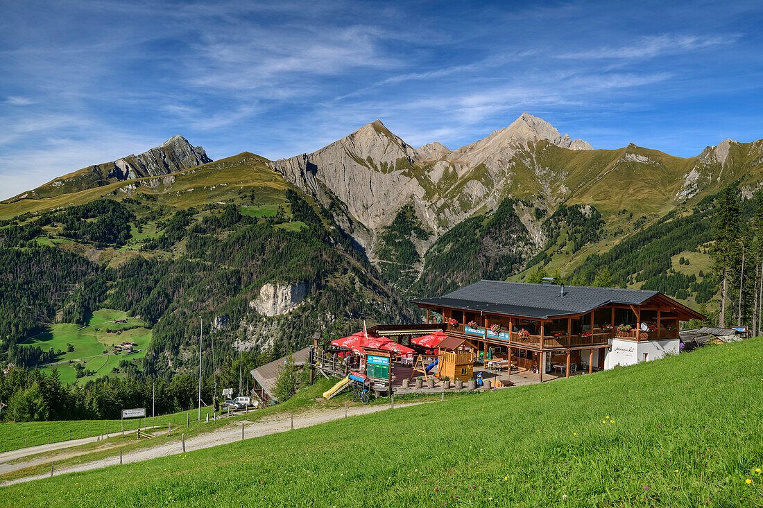 Künzeralm sun terrace with Bretterwandspitze and Kendlspitze in the background, Künzeralm, Hohe Tauern, Hohe Tauern National Park, East Tyrol, Austria