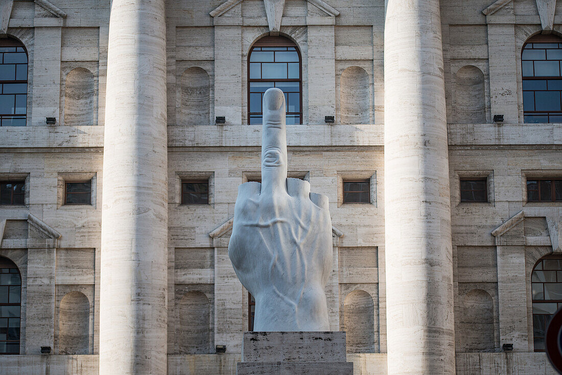 Maurizio Cattelan L.O.V.E. sculpture, piazza della Borsa, Milan, Italy