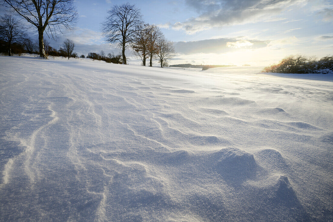 Snowdrifts at Salmendinger Chapel in the back light, pilgrimage chapel near Burladingen, Zollernalb district, Swabian Jura, Baden-Württemberg, Germany, Europe