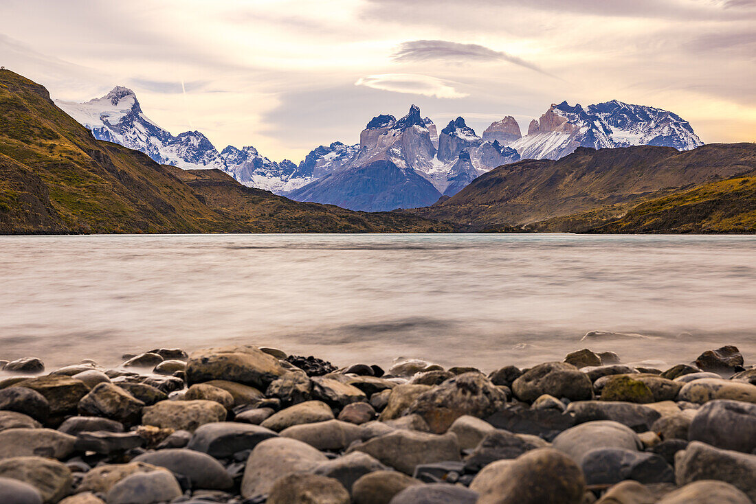 Long exposure at Lake Pehoe with the mountains of the Torres del Paine mountain range in southern Patagonia, Chile, South America