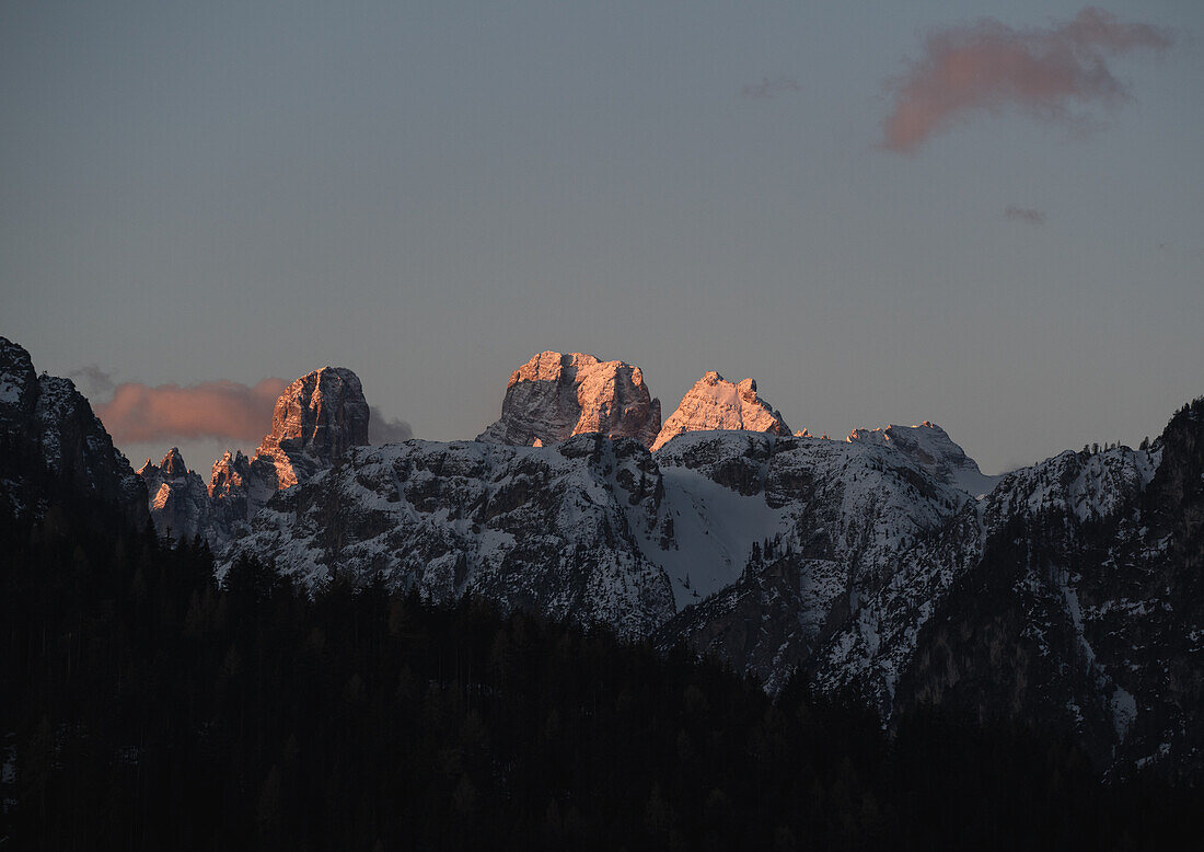 Glowing mountain peaks at sunset in the Dolomites, Toblach, South Tyrol