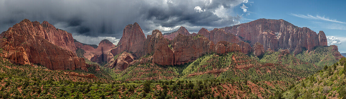 Panoramic view of mountain wall. Dark clouds are gathering. Kolob View.