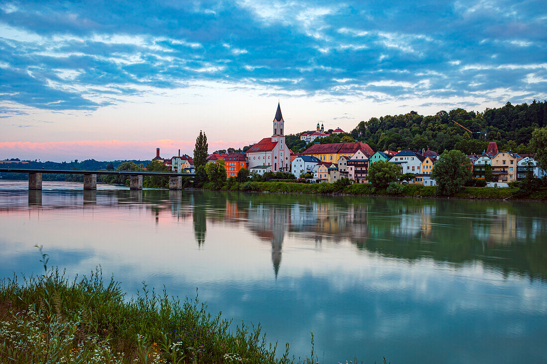 Inn with St. Gertraud Church on the river bank in Passau, Bavaria, Germany