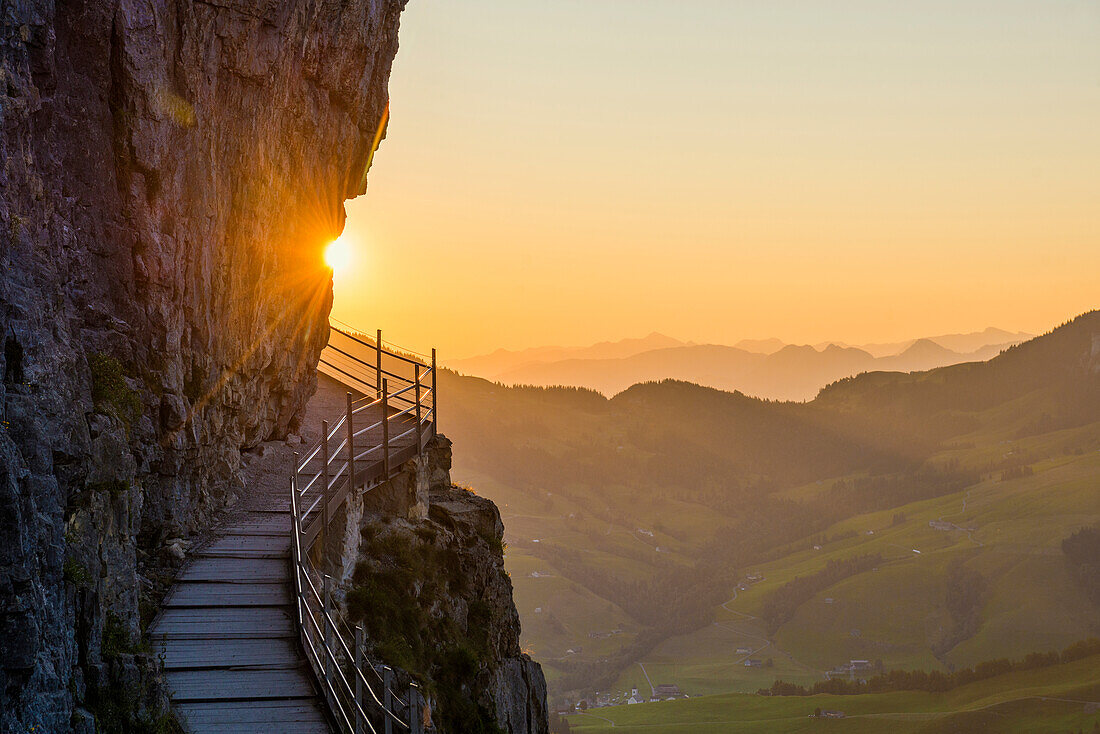 Hiking trail to the Aescher-Wildkirchli mountain inn, sunrise, below Ebenalp, Weissbad, Alpstein, Canton of Appenzell Innerrhoden, Switzerland