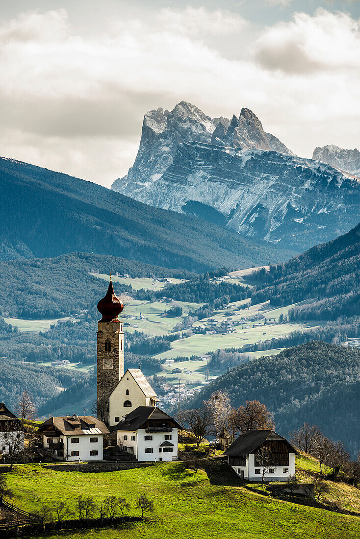 Snow-covered mountains and church, St. Nicholas Church, spring, Mittelberg am Ritten, near Bozen, Dolomites, South Tyrol, Italy