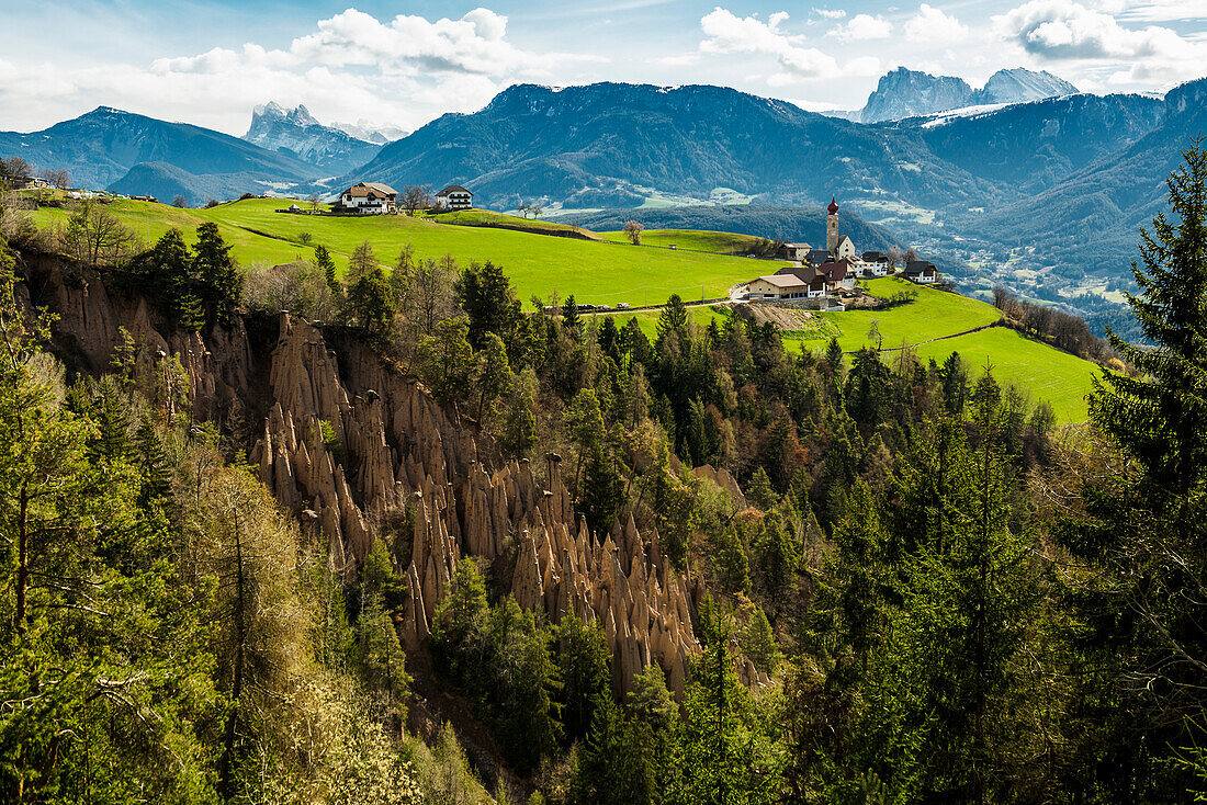 Snow-covered mountains and church, St. Nicholas Church, spring, Mittelberg am Ritten, near Bozen, Dolomites, South Tyrol, Italy