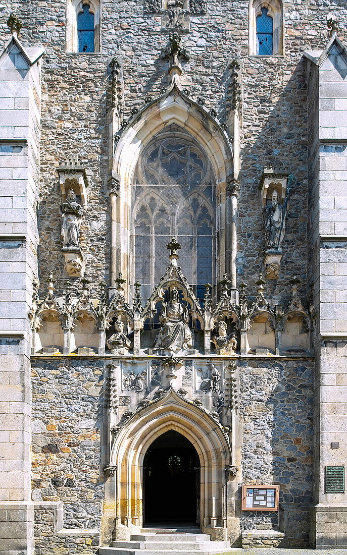 Main facade and sculptural decoration of the Gothic parish church of the Nativity of the Virgin Mary in Klatovy in West Bohemia in the Czech Republic