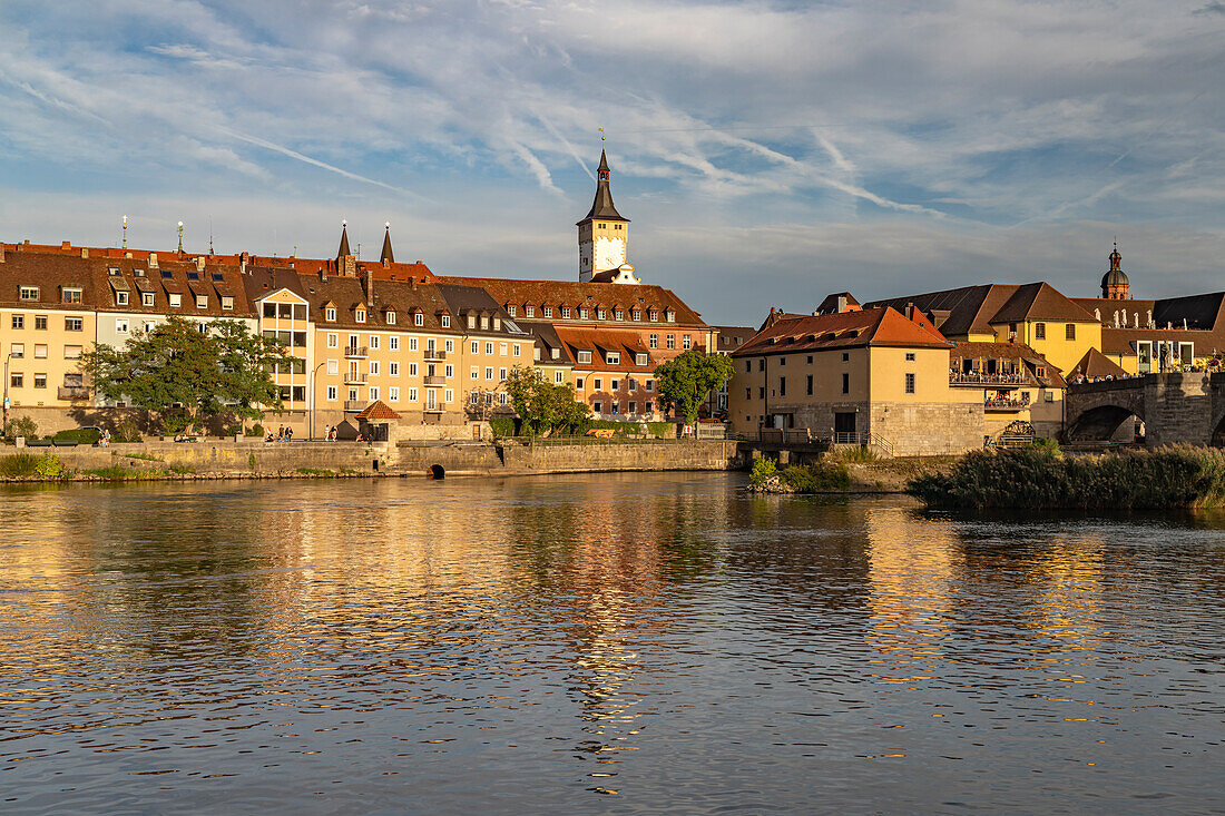 The Mainkai, tower of the old town hall and the old town of Würzburg, Bavaria, Germany